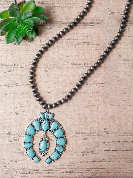 Talk of the Town Turquoise Squash Blossom Pendant Navajo Pearls Necklace