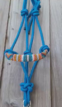 Load and play video in Gallery viewer, Cowgirl Roots™  Serape Warrior, Beaded Rope Horse Halter, with Lead Rope, Horse and Pony Blueer, with Lead Rope, Horse and Pony

